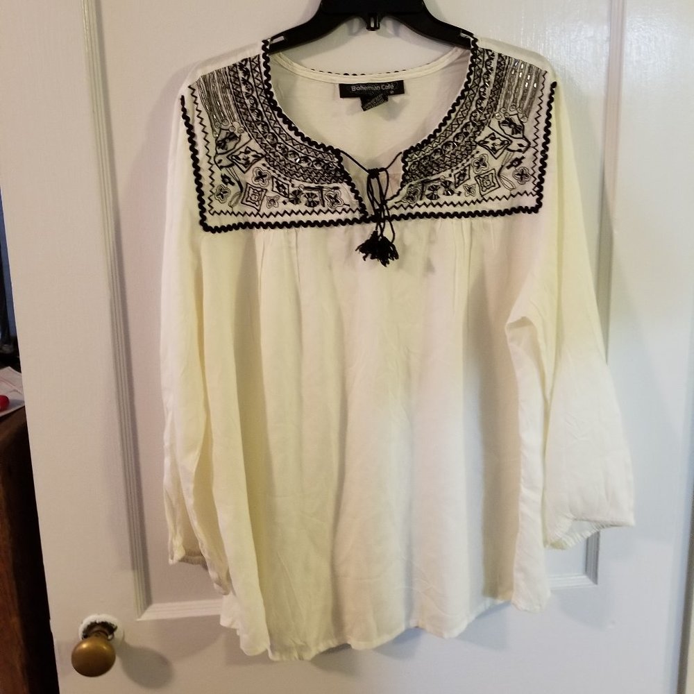 Bohemian Cafe.  2X.  Black and white top